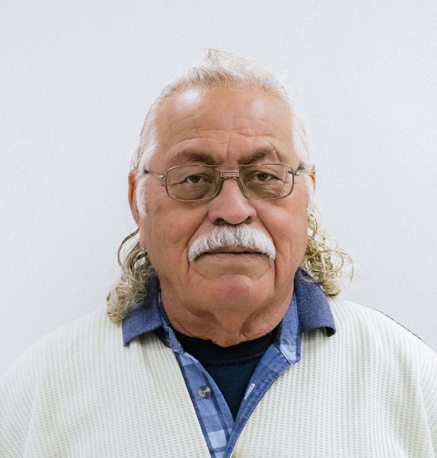 Councilor Ignacio Mariscal photographed in front of white background
